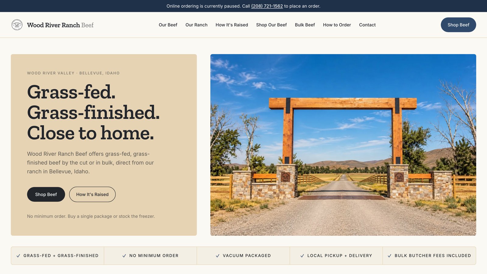 The Wood River Ranch Beef homepage: a cream editorial hero beside a photo of the ranch gate on Highway 75